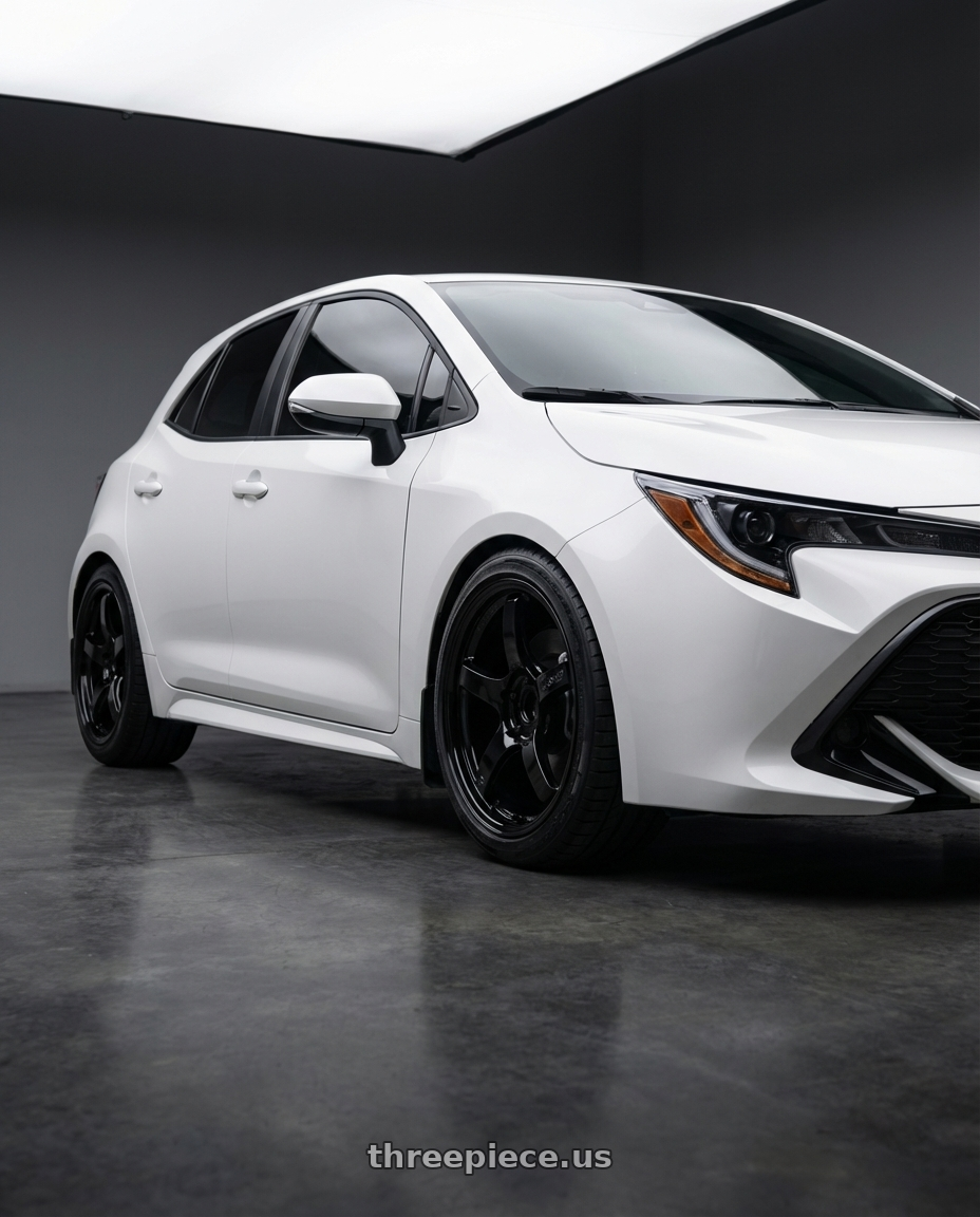 2023 Toyota Corolla Hatchback with Gram Lights 57CR 5x114.3 18x10.5+12 Glossy Black wheels