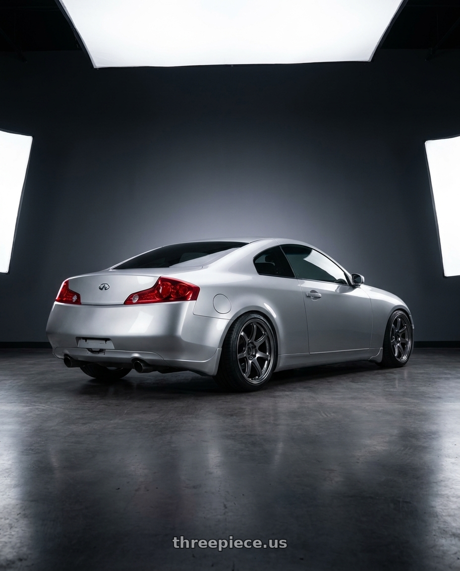 2005 infiniti g35 coupe, silver with Enkei PF09 5x114.3 18x9.5+15 Dark Silver wheels rear three quarter view slight stretch tires