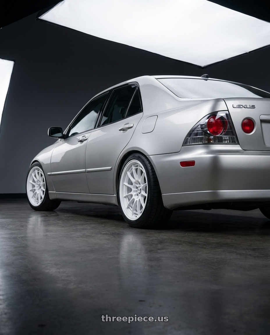 2002 Lexus is300 with Enkei NT03+M 5x114.3 18x9.5+40 Vanquish White wheels rear three quarter view square tires