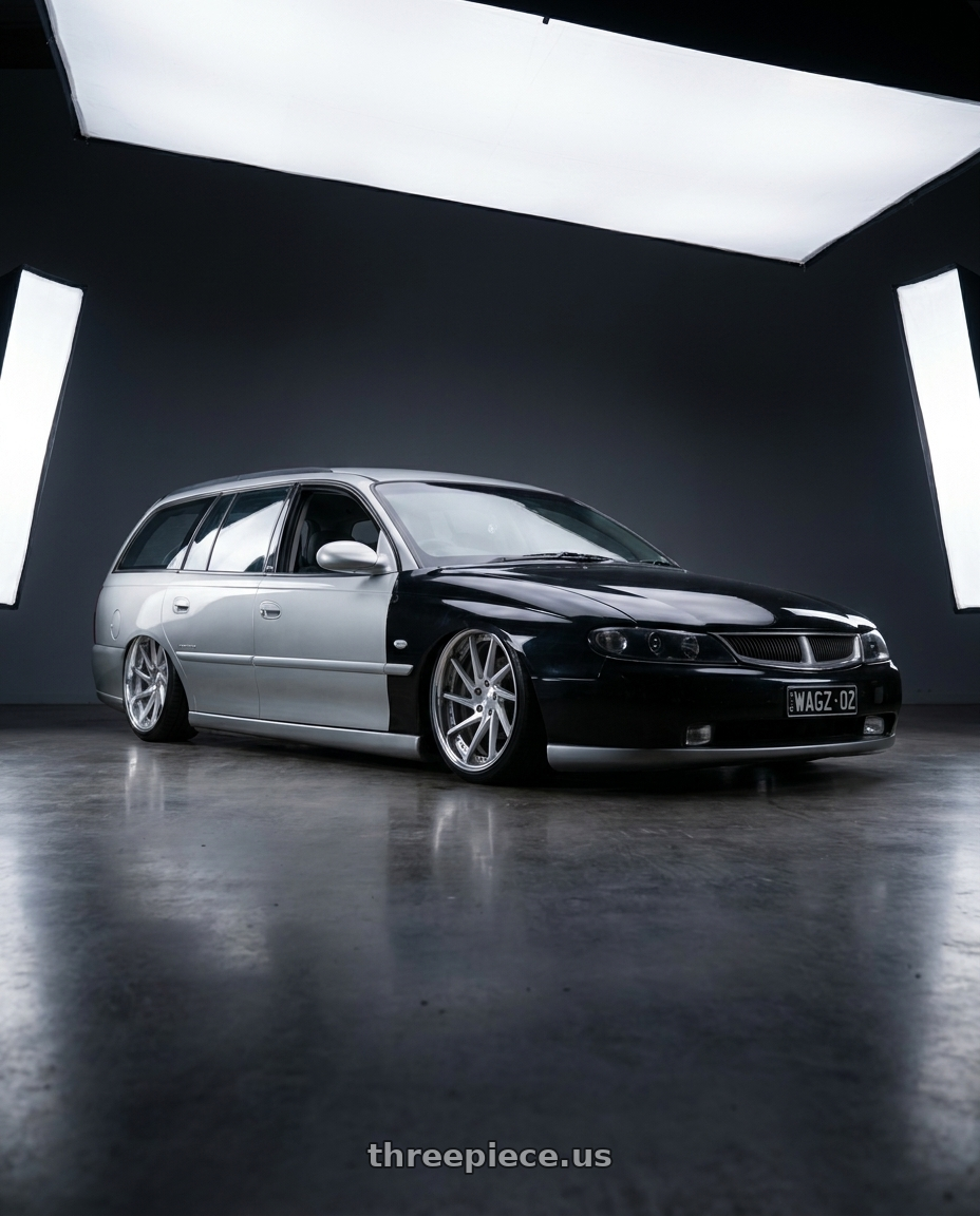 2002 holden vx berlina wagon with Work Gnosis Cvs 5x120.65 19x9.5+30 A Disk Brush Silver Clear wheels