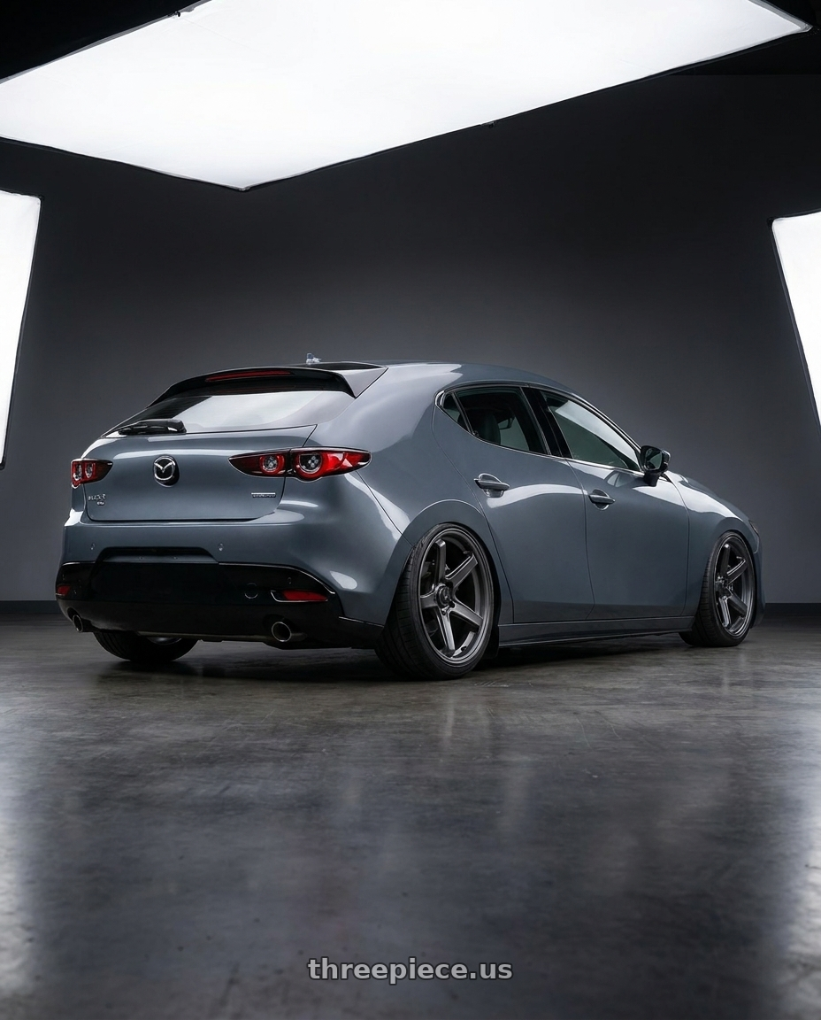 2023 Mazda Mazda3 Turbo with Konig Neoform 5X114.3 18x9.5+25 Matte Grey wheels rear three quarter view slight stretch tires