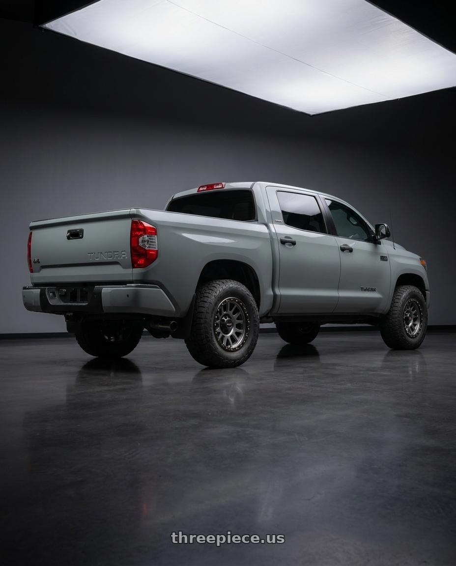 2018 Toyota Tundra with Vision Off-Road 111 Nemesis 5x150 20x9+18 Gunmetal wheels rear three quarter view meaty tires
