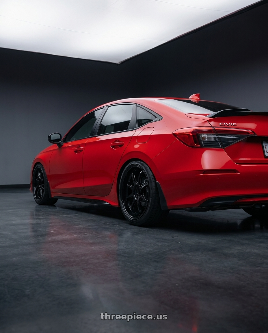 2026 Honda civic si with Work Emotion D9r 5x100 18x9.5 +38 Black wheels rear three quarter view slight stretch tires