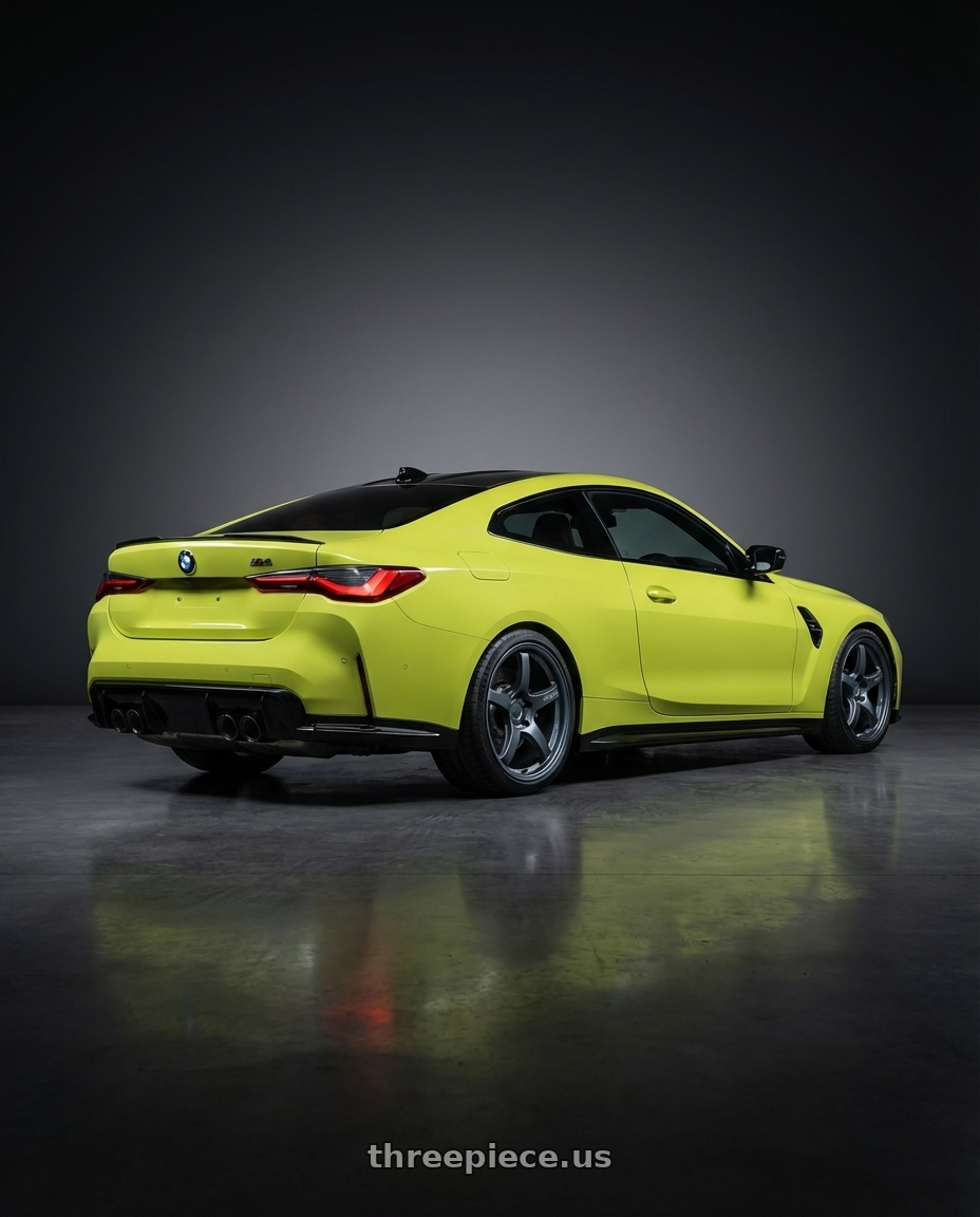 2024 BMW M4 G82 with Gram Lights 57CR 5x112 19x9.5+45 Gunblue II wheels rear three quarter view square tires