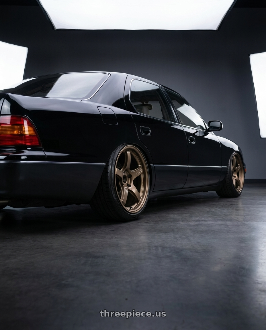 1995 toyota celsior, black with Gram Lights 57CR 5x114.3 18x9.5 +22 BRONZE 2 wheels rear three quarter view slight stretch tires