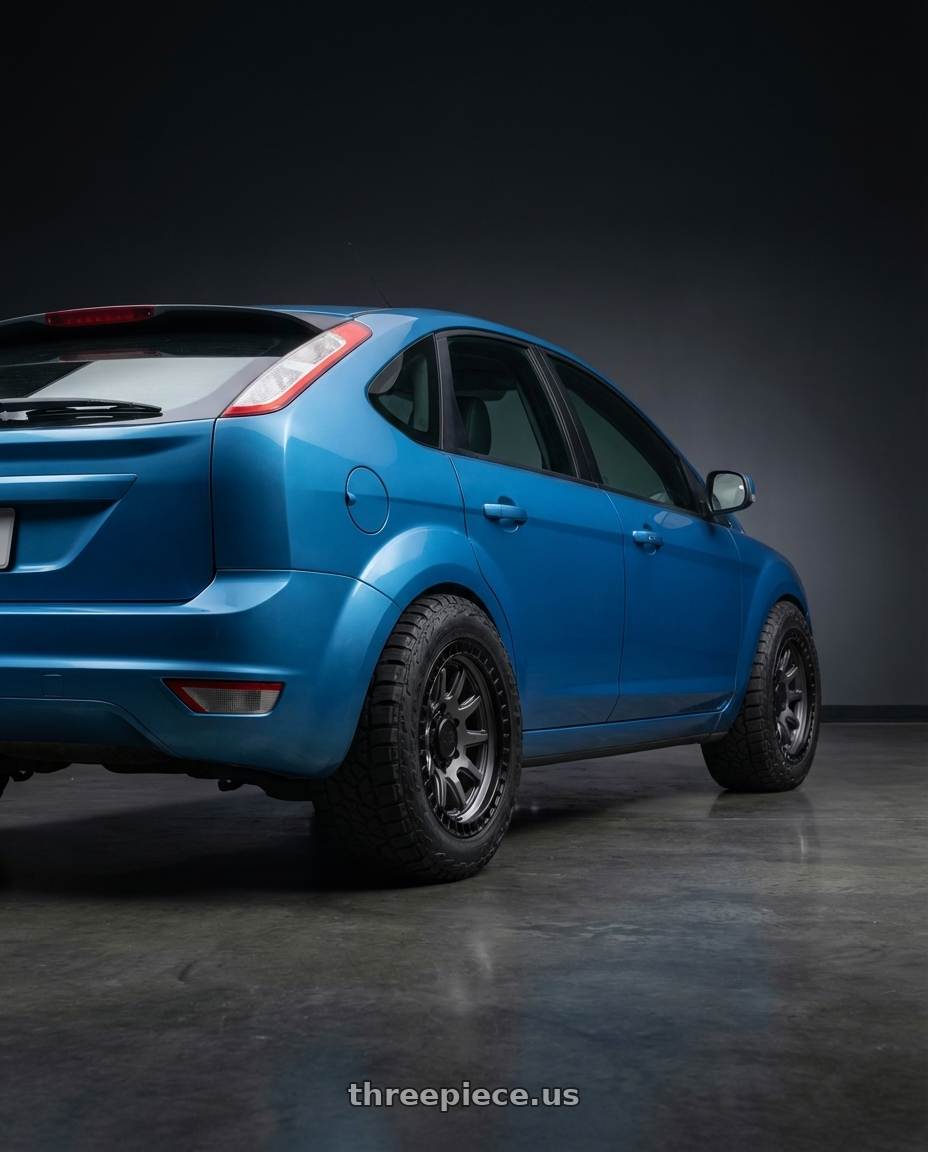 Ford focus 2009  with Black Rhino CALICO 5X127 17X8.5 +34 MATTE GUNMETAL W/ MATTE BLACK LIP wheels rear three quarter view meaty tires