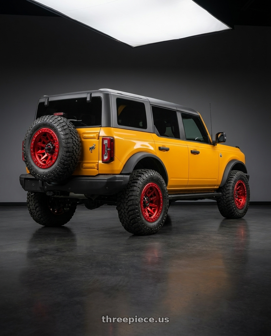 2024 Ford Bronco with Fuel 1PC D113 COVERT BEADLOCK 6X139.7 17X9 -15 CANDY RED wheels rear three quarter view meaty tires