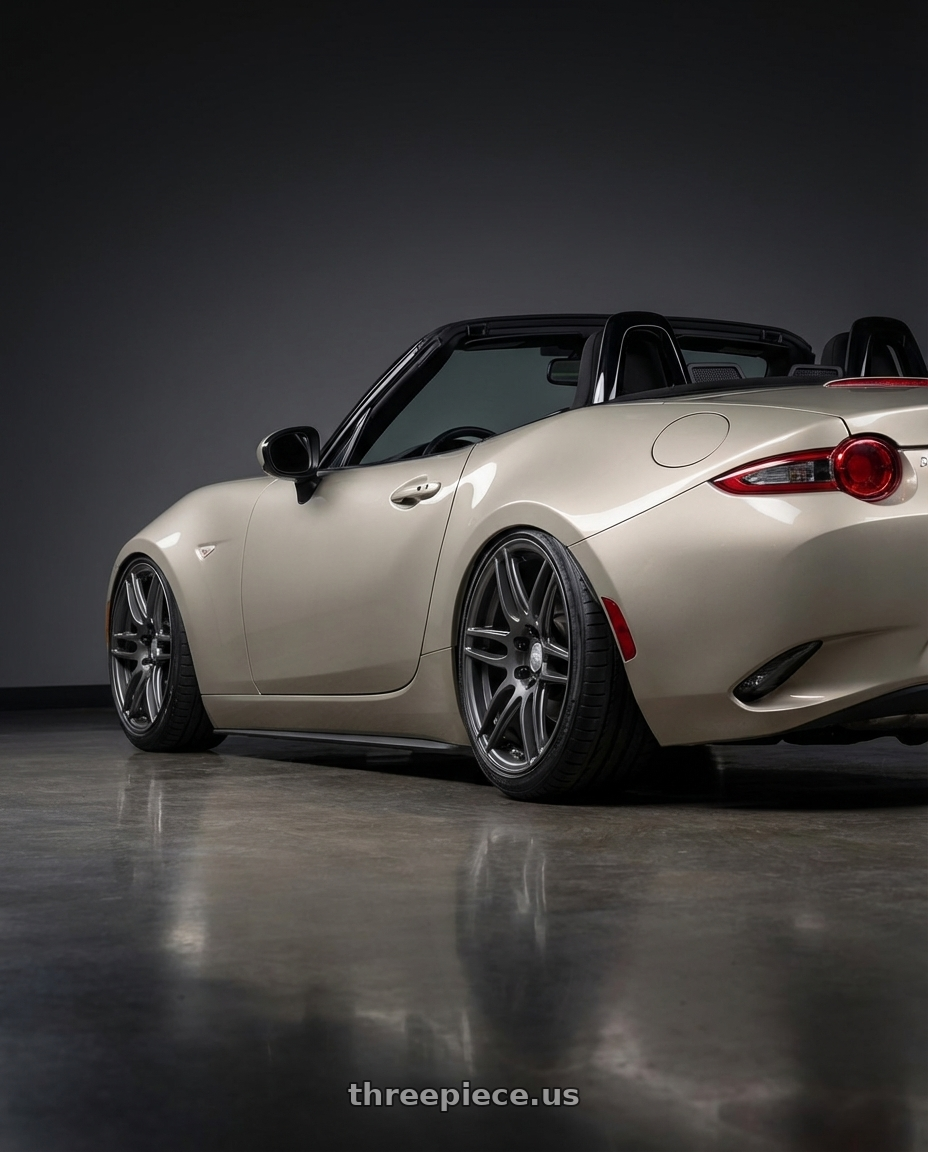2021 Mazda MX-5 Miata ND with Niche 1PC M105 NR6 5X114.3/5X120 17X7.5 +45 MATTE GUN METAL wheels rear three quarter view slight stretch tires
