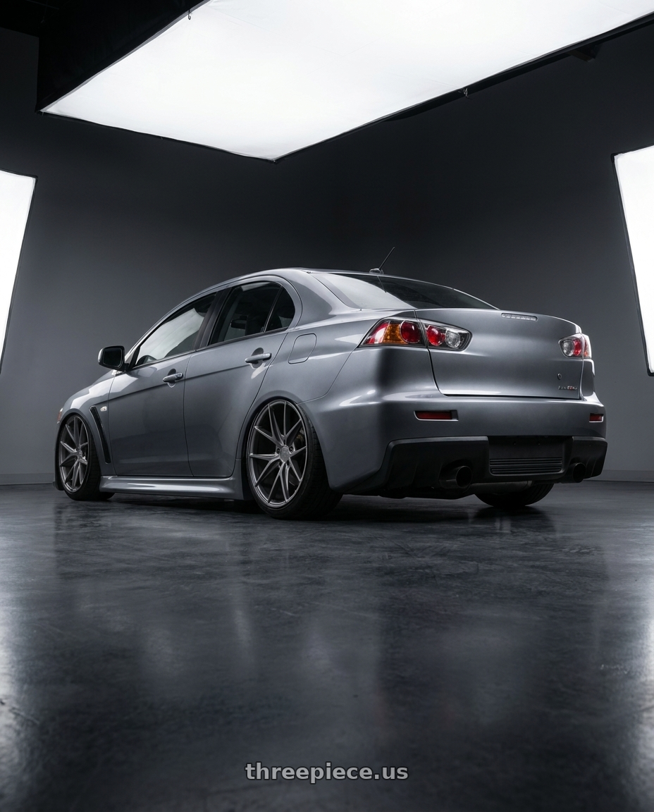 2014 Mitsubishi Lancer Ralliart with Niche 1PC M116 MISANO 5X114.3 18X8 +40 MATTE GUN METAL wheels rear three quarter view slight stretch tires