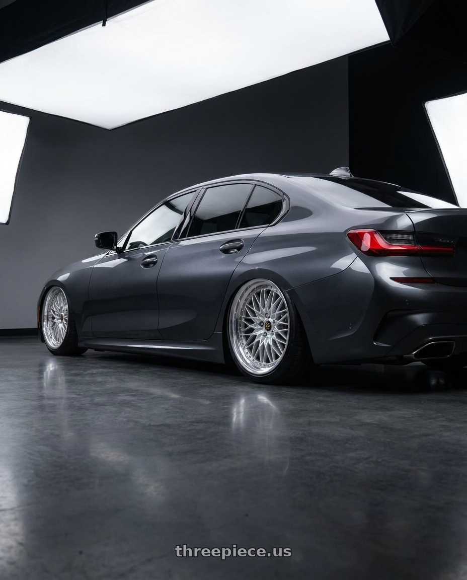2020 bmw m340i with Work Vs-Xv 5x112 19x8.5+27 O Disk Silky Rich Silver wheels rear three quarter view slight stretch tires