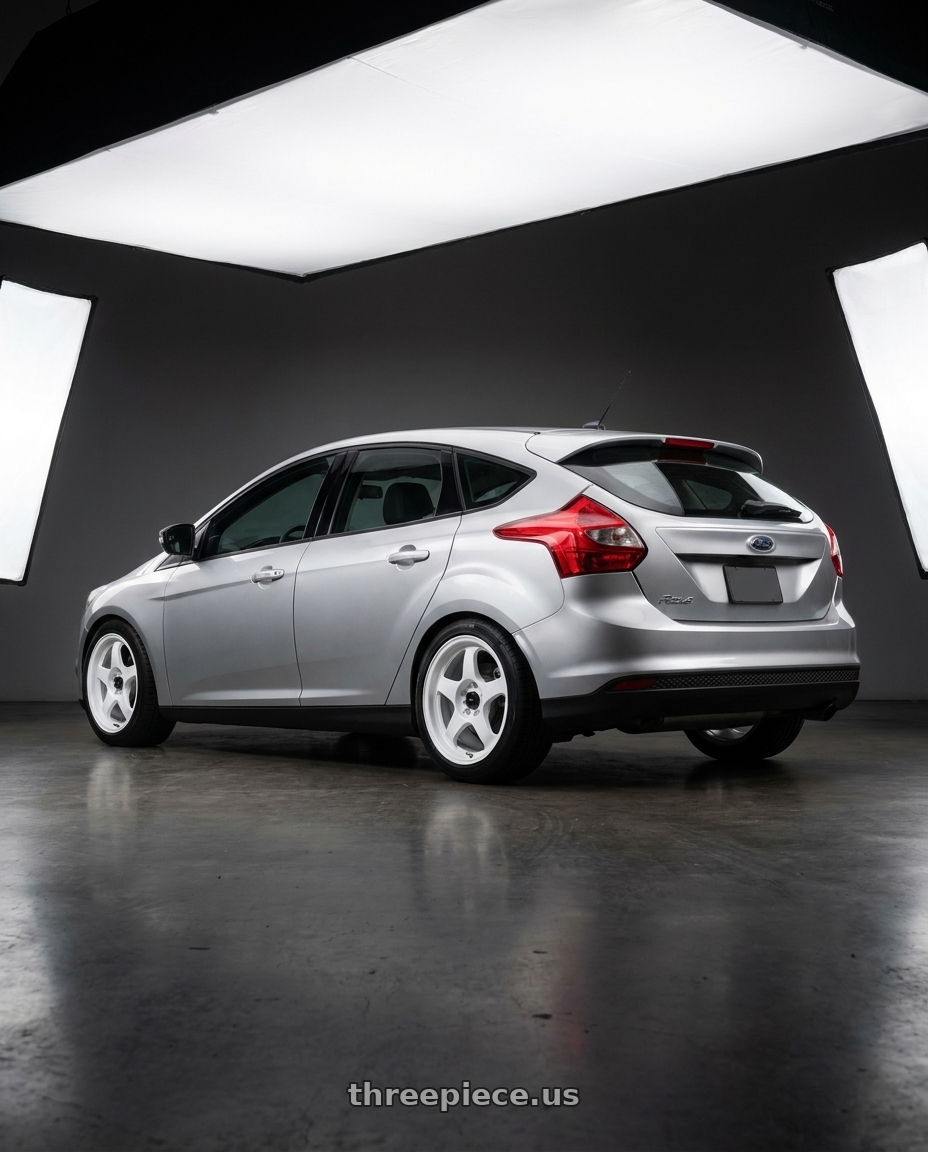 2011 Ford Focus with Vors SP1 4x108 15x7  +35 All White wheels rear three quarter view square tires