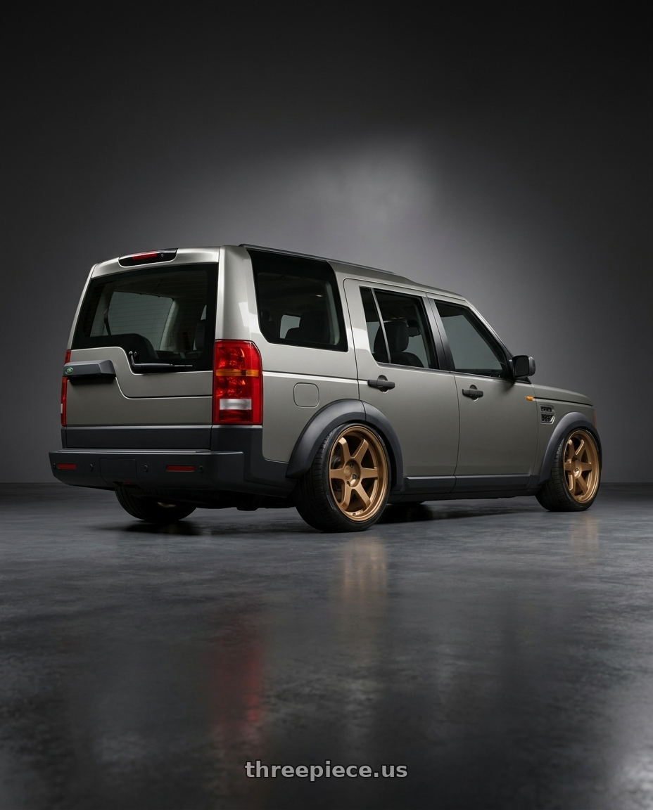 2005 Land rover discovery 3 with 9six9 SIX-1 5x120 19X10 +35 Matte Bronze wheels rear three quarter view slight stretch tires