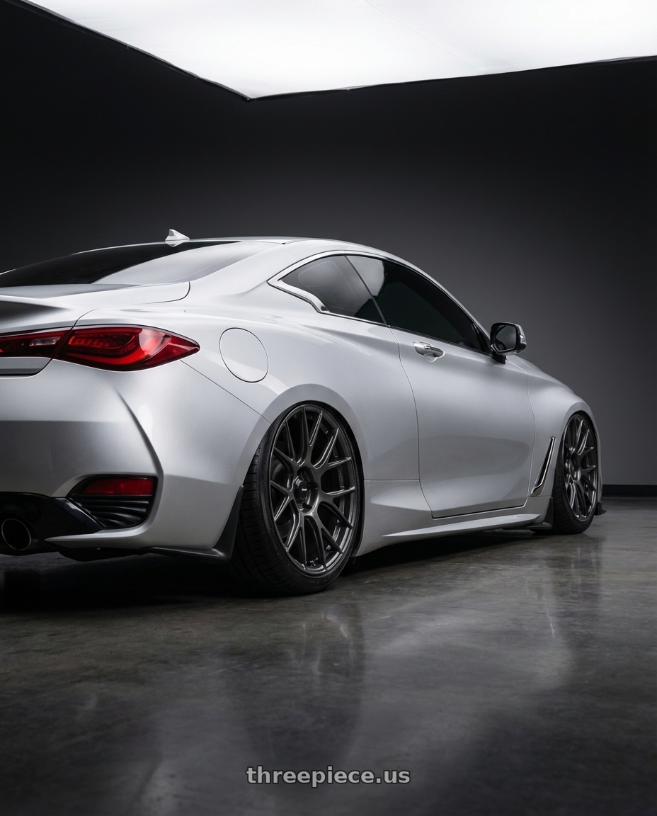 2020 Infiniti Q60 with Konig Ampliform 5x114.3 20x8.5+30 Dark Metallic Graphite wheels rear three quarter view slight stretch tires