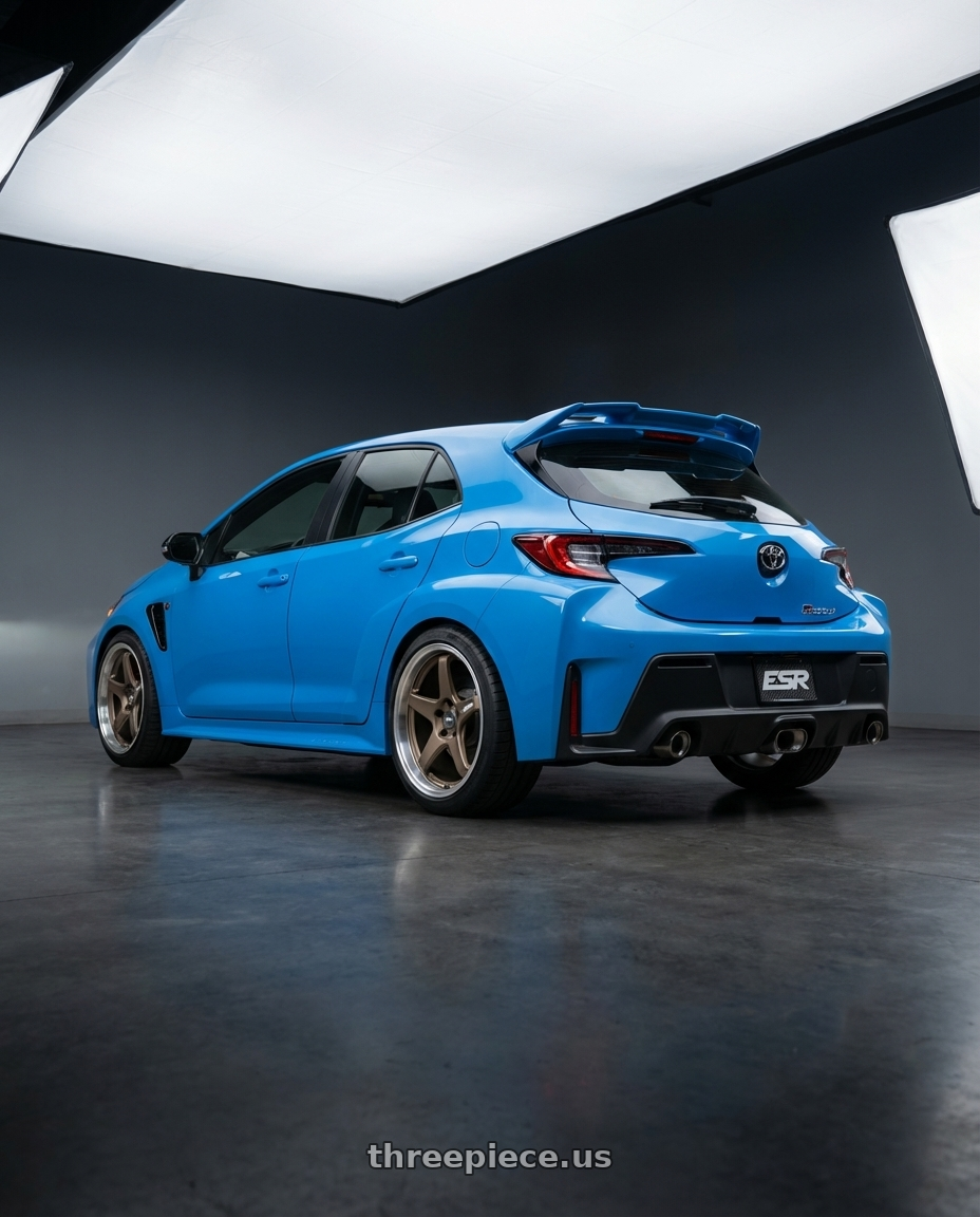 2024 Toyota GR Corolla with ESR Wheels APEX SERIES AP5 5x114.3 18x10.5 +22 Matte Bronze wheels rear three quarter view square tires