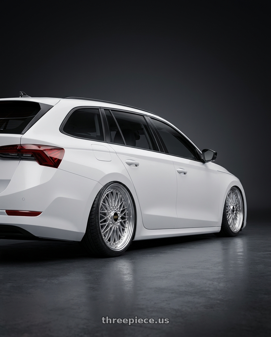 2025 SKODA OCTAVIA with BBS Super 5x112 19x8.5 +43 Diamond Silver wheels rear three quarter view slight stretch tires