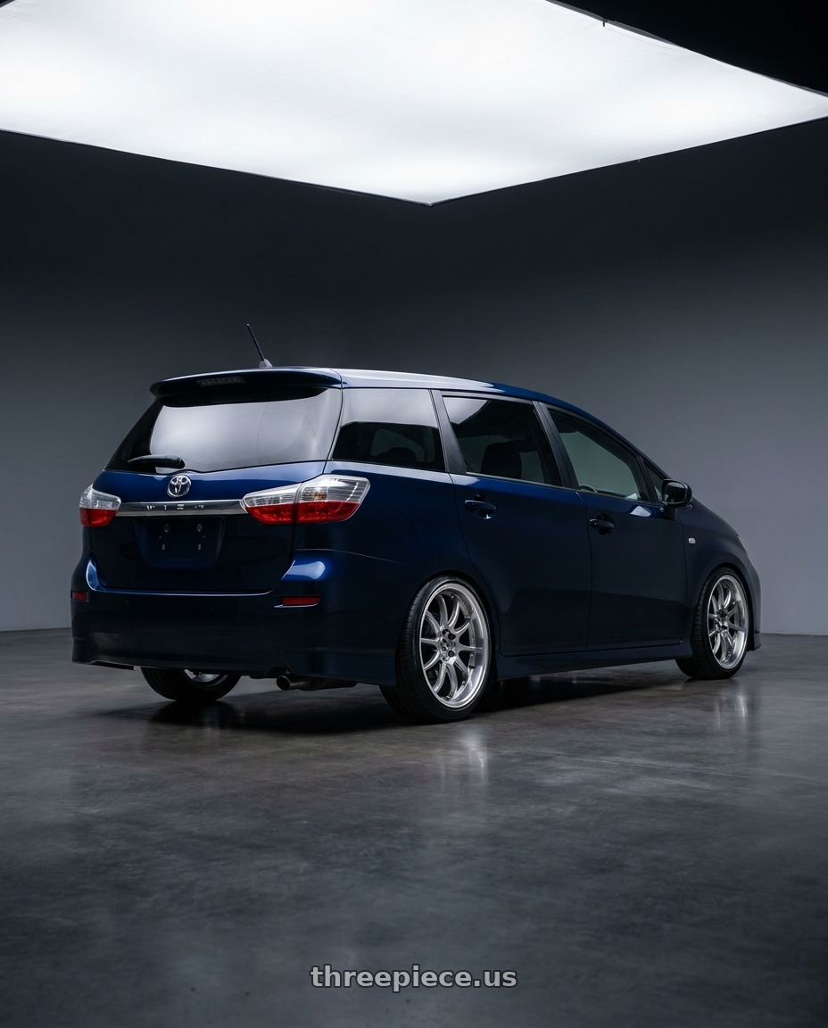 2008 TOYOTA WISH , ink blue with Work Emotion D9r 5x100 18x8.5 +47 Gt Silver Rim Cut wheels rear three quarter view slight stretch tires