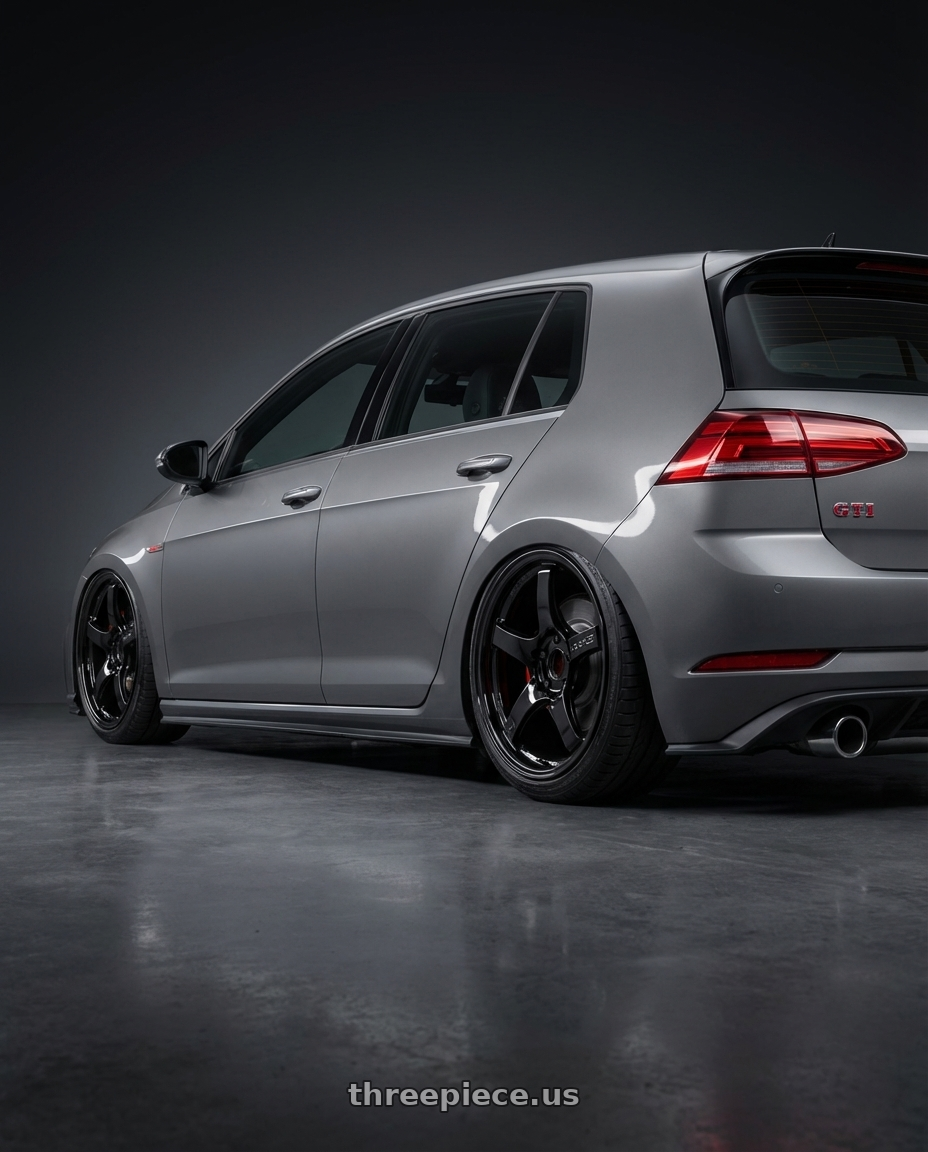 2019 Volkswagen GTI MK7 with Gram Lights 57CR 5x112 19x9.5+25 Glossy Black wheels rear three quarter view slight stretch tires