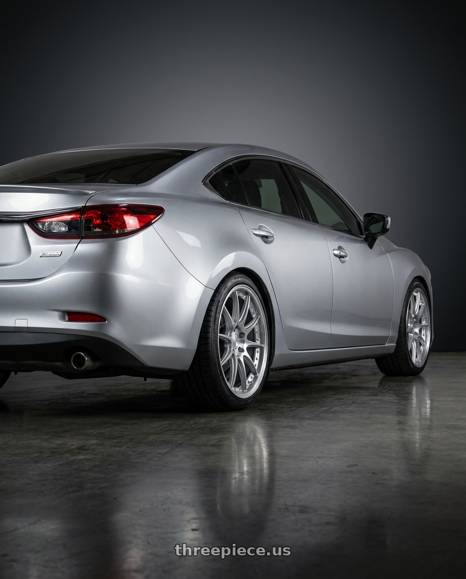 2016 Mazda 6 with Aodhan DS07 5x114.3 18x8.5+35 Silver w/Machined Face wheels rear three quarter view square tires