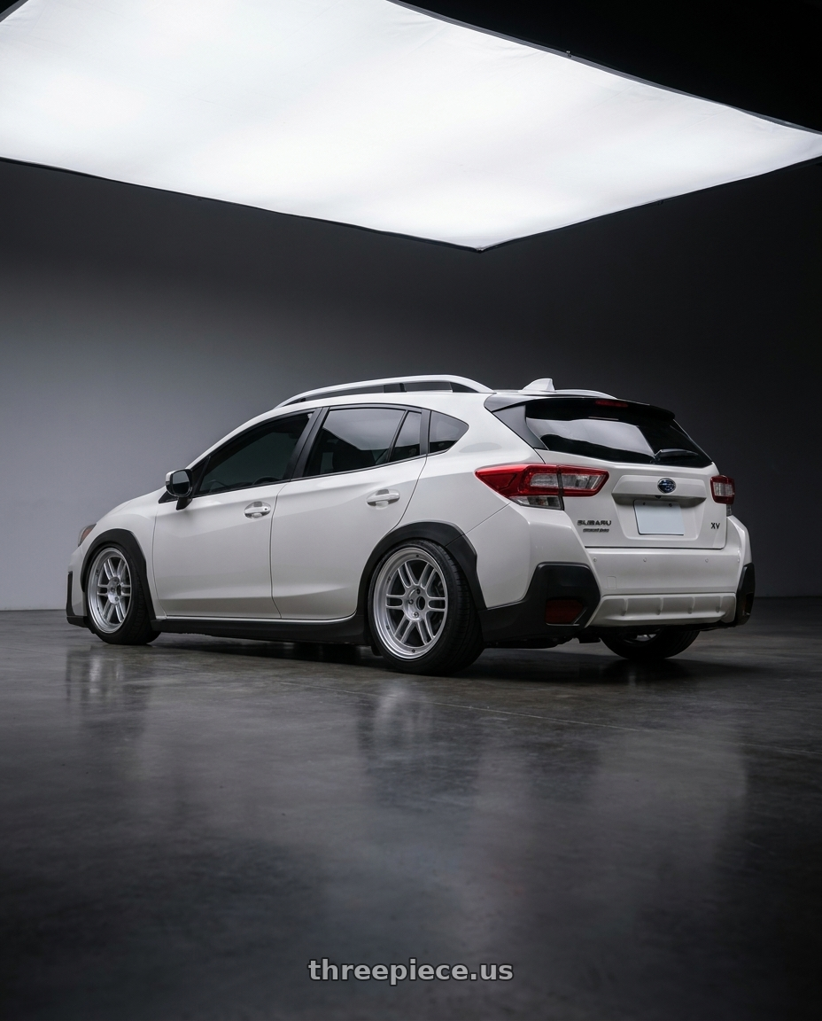 2022 SUBARU XV with Enkei RPF1 5x112 18x7.5+48 Silver wheels rear three quarter view square tires