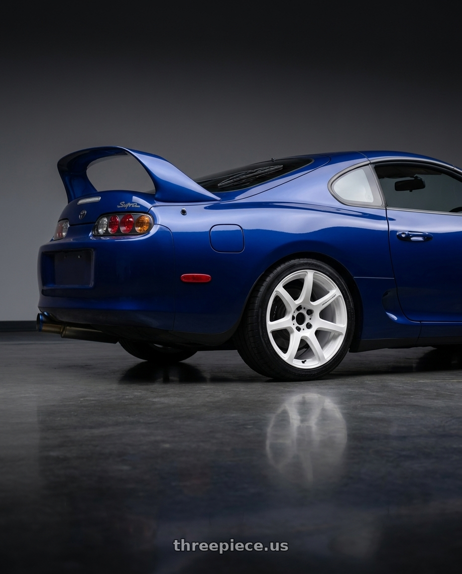 1997 Toyota Supra with Work Emotion T7r 5x114.3 18x9.5 +38 White wheels rear three quarter view square tires