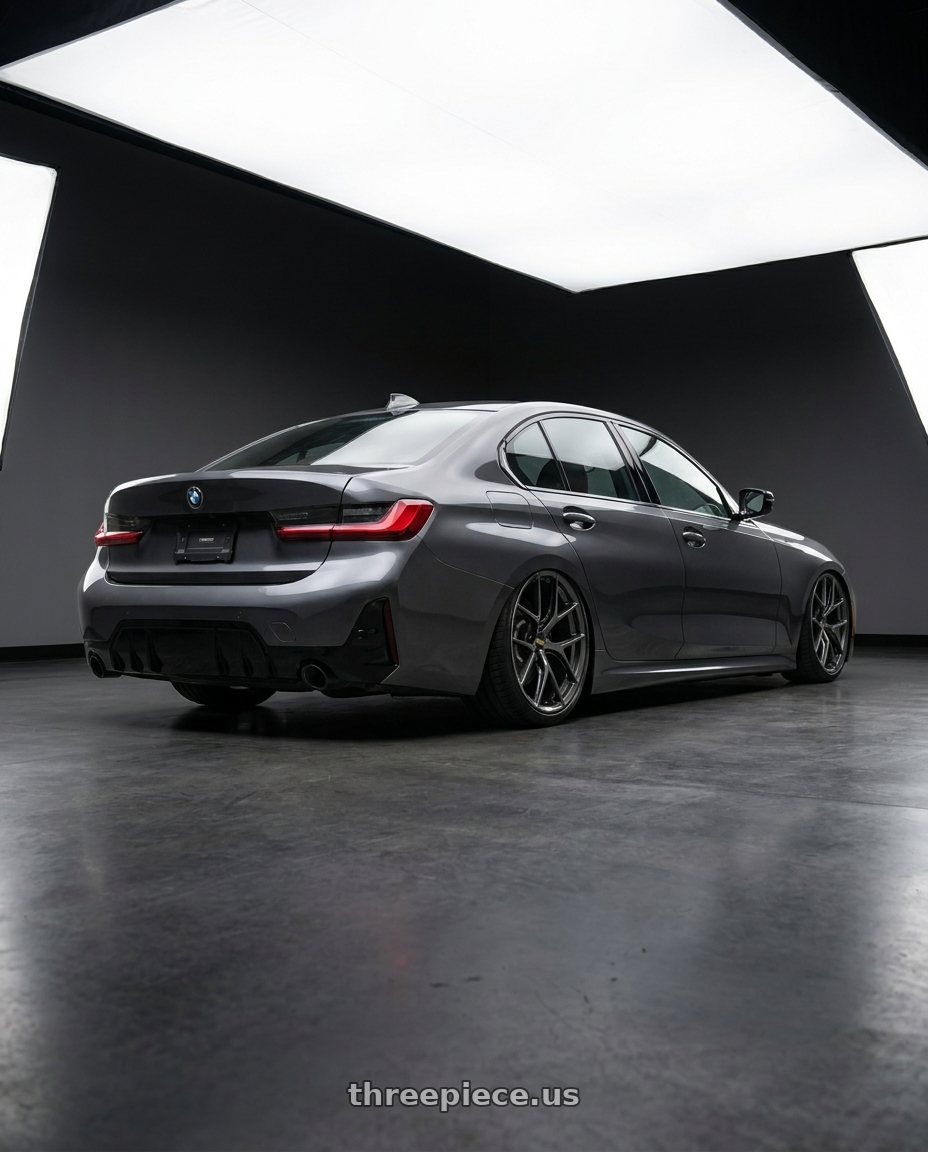 2022 Bmw g20320i with BBS FI-R 5x114.3 20x8.5+51.5 Gloss Graphite wheels rear three quarter view slight stretch tires