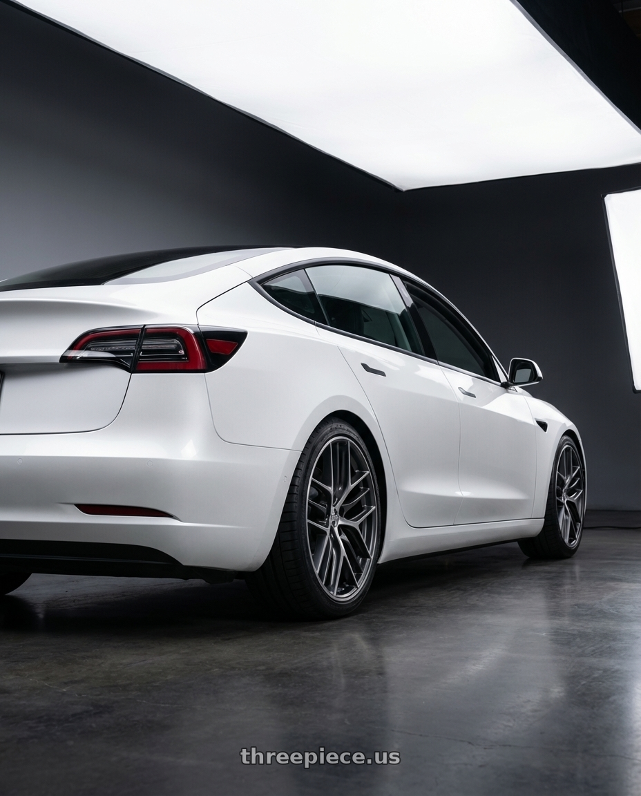2023 Tesla Model 3 with BBS CC-R 5x114.3 19x8.5+30 Graphite w/ Diamond Cut Face wheels rear three quarter view square tires