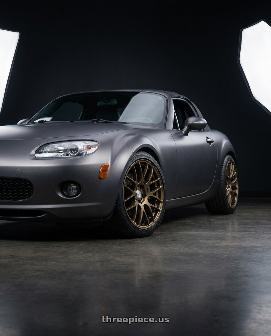 2007 Mazda Miata MX-5 with Work Emotion m8r 5x114.3 17x7 +47 Matte Bronze wheels
