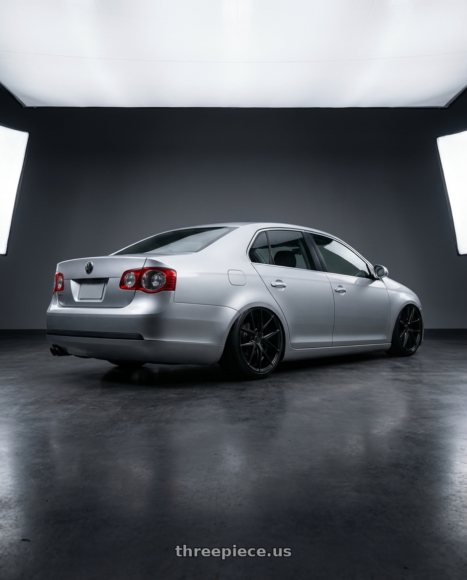 2009 Volkswagen Jetta GLI MK5 with Niche 1PC M117 MISANO 5X112 18X8 +30 MATTE BLACK wheels rear three quarter view slight stretch tires