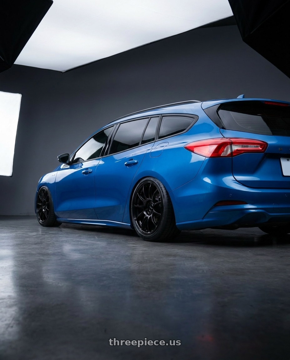 2025 ford focus wagon with Advan RGIII 5x114.3 19x9.0+25 Gloss Black wheels rear three quarter view extreme stretch tires