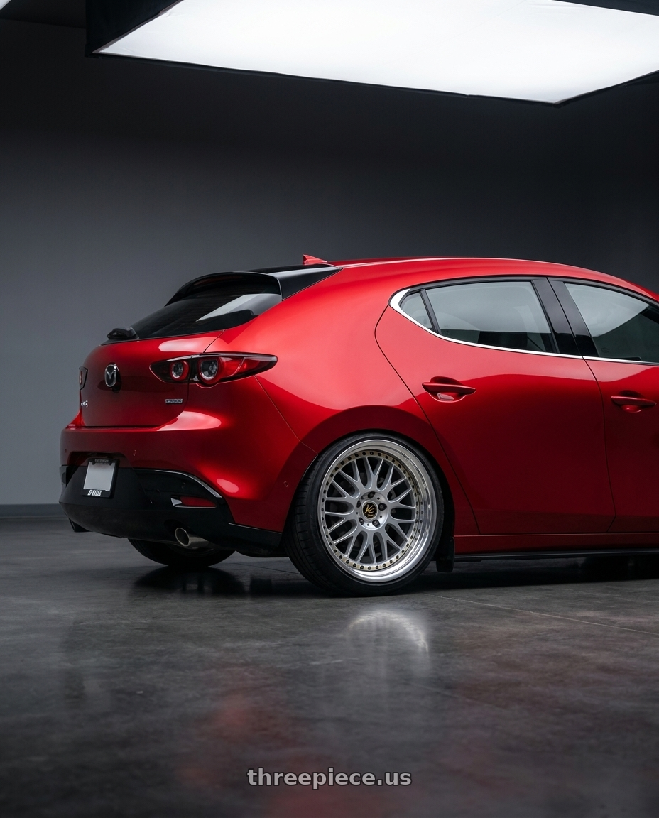 2025 Mazda 3 with Work Vs-Xx 5x100 18x8.5+32 A Disk Light Grey Silver wheels rear three quarter view square tires
