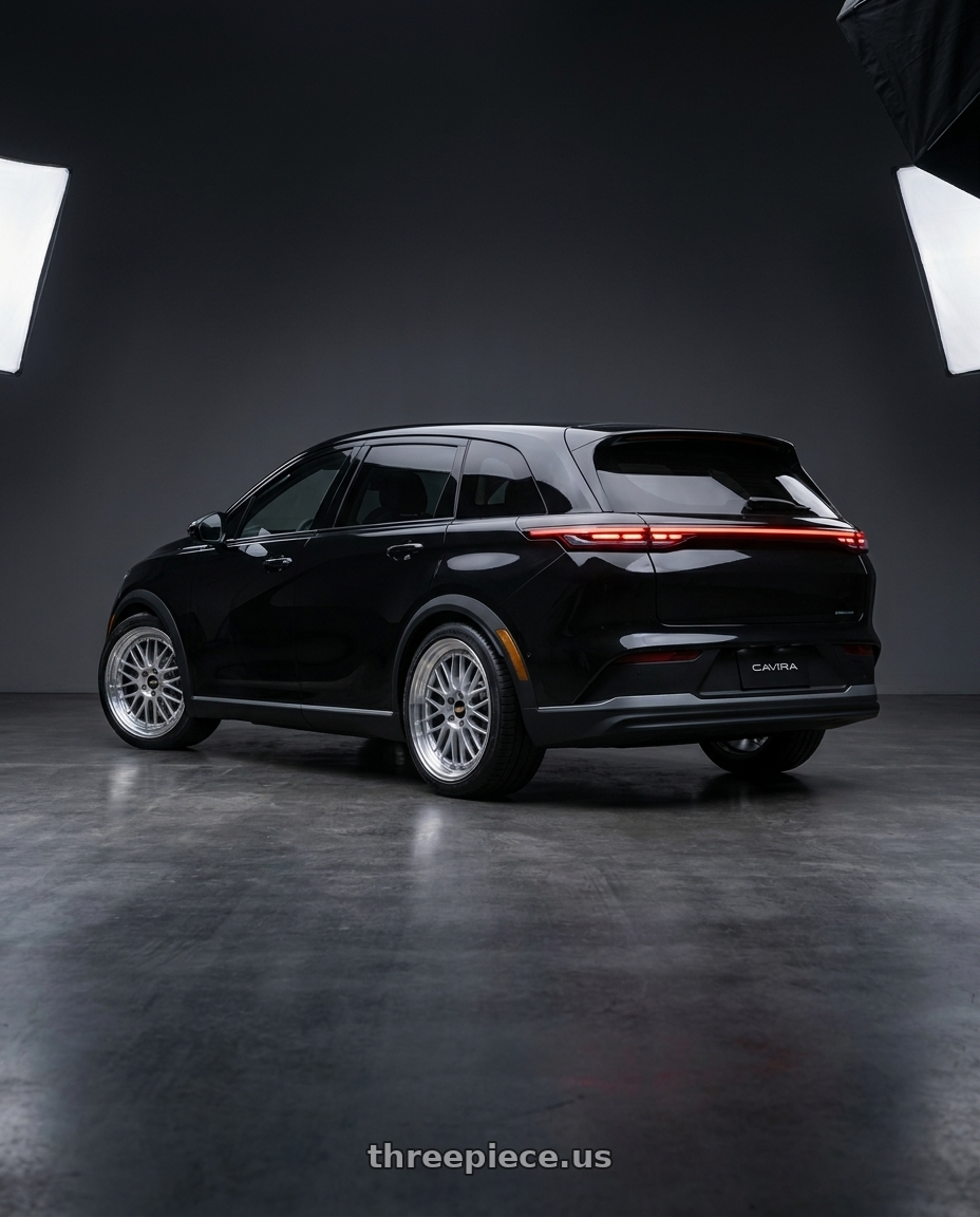 2026 foxtron cavira black with BBS LM 5x120 21x9.0+32 Diamond Silver wheels rear three quarter view square tires