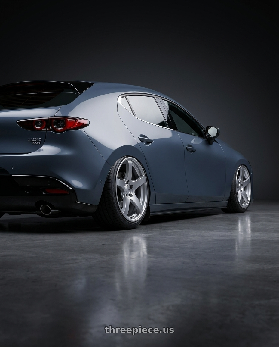 2023 Mazda Mazda3 Turbo with Ssr Gtv01 5x114.3 18x8+35  GLARE SILVER wheels rear three quarter view slight stretch tires