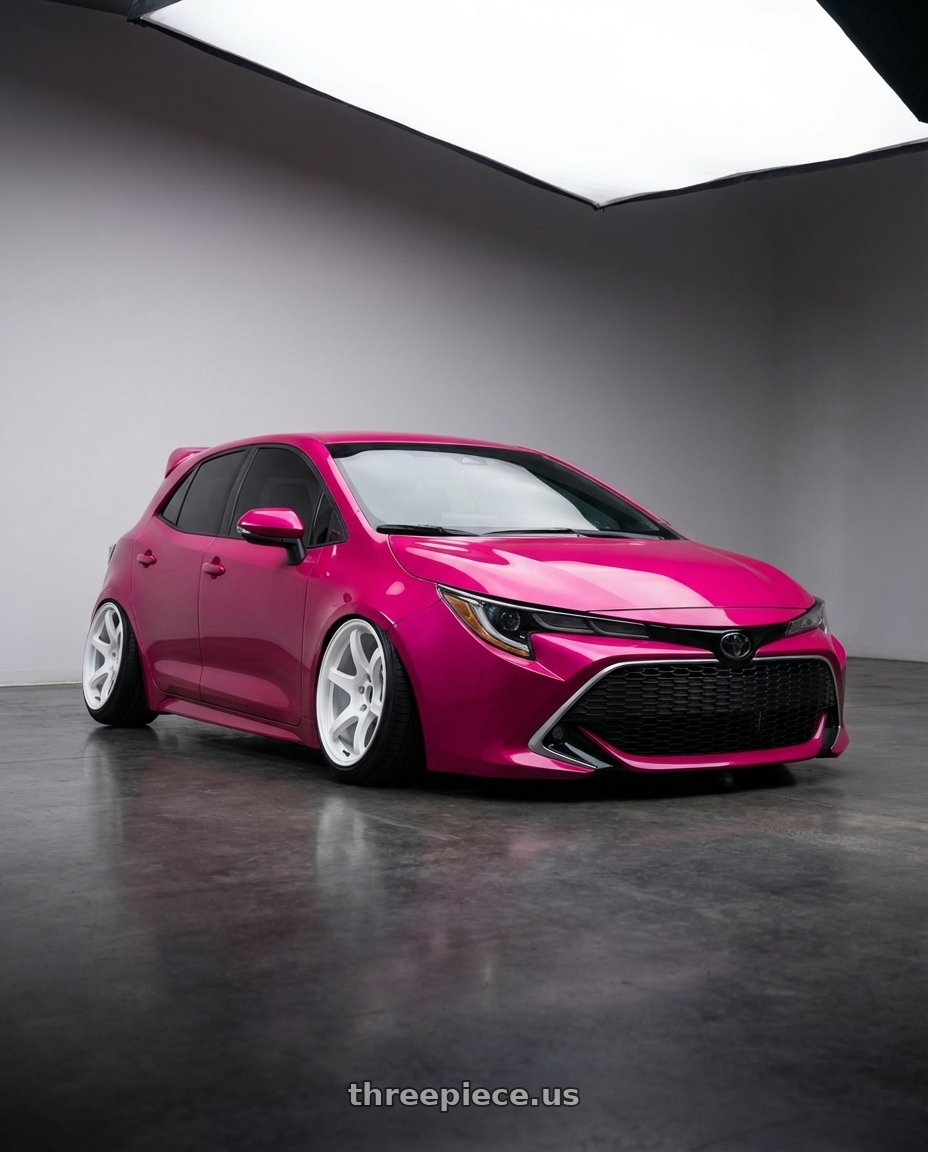 2019 Toyota Corolla Hatchback SE with Gram Lights 57CR 5x114.3 15x8+35 Ceramic Pearl wheels