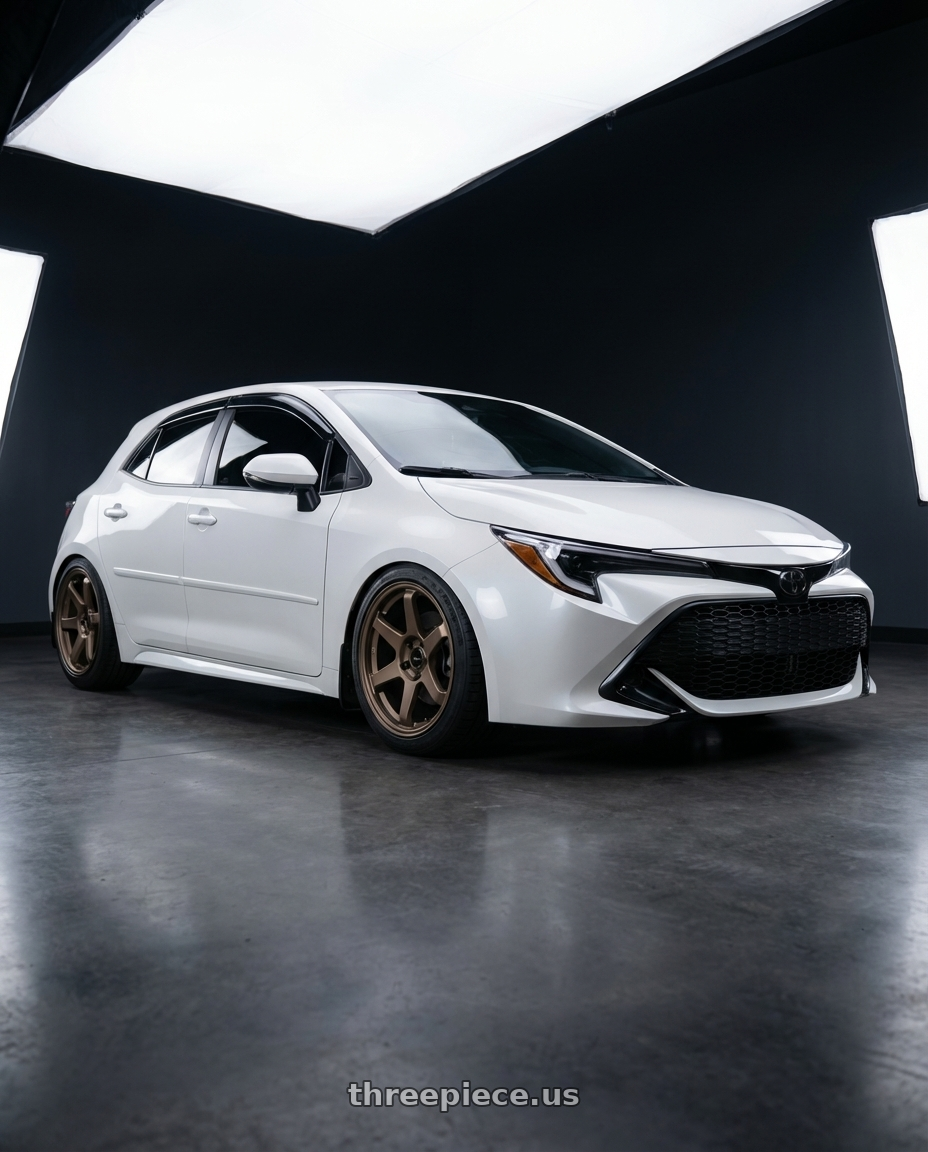 2025 Toyota Corolla Hatchback with Enkei T6R 5x100 17x8+45 Matte Bronze wheels