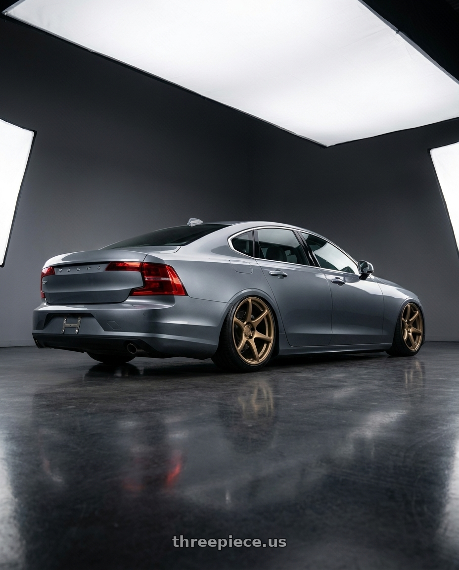 2020 Volvo S90 with Kansei K11B Tandem 5x114.3 19x10.5 22 Bronze wheels rear three quarter view slight stretch tires