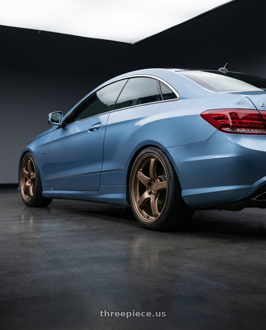 2014 Mercedes-Benz E-Class Coupe C207 with Gram Lights 57CR 5x112 19x10.5+35 Bronze II wheels rear three quarter view square tires
