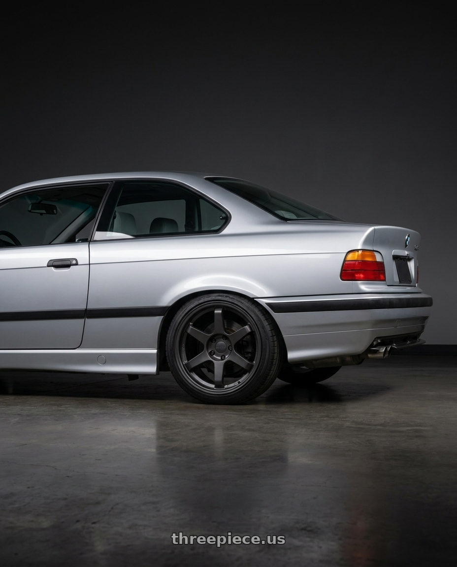 1999 Bmw 328Is with 9six9 SIX-1 5x112 18X8.5 +35 Carbon Gray wheels rear three quarter view square tires