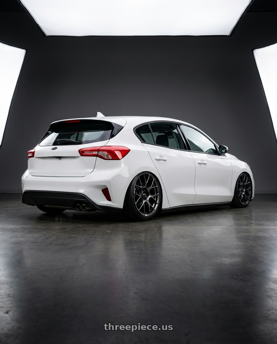 2020 Ford focus with BBS RE-V7 5x112 18x10 +38 Diamond Black wheels rear three quarter view slight stretch tires