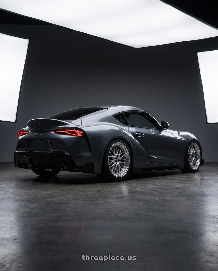 2019 TOYOTA SUPRA with BBS LM 5x112 19x9.5+38 Diamond Silver wheels rear three quarter view square tires
