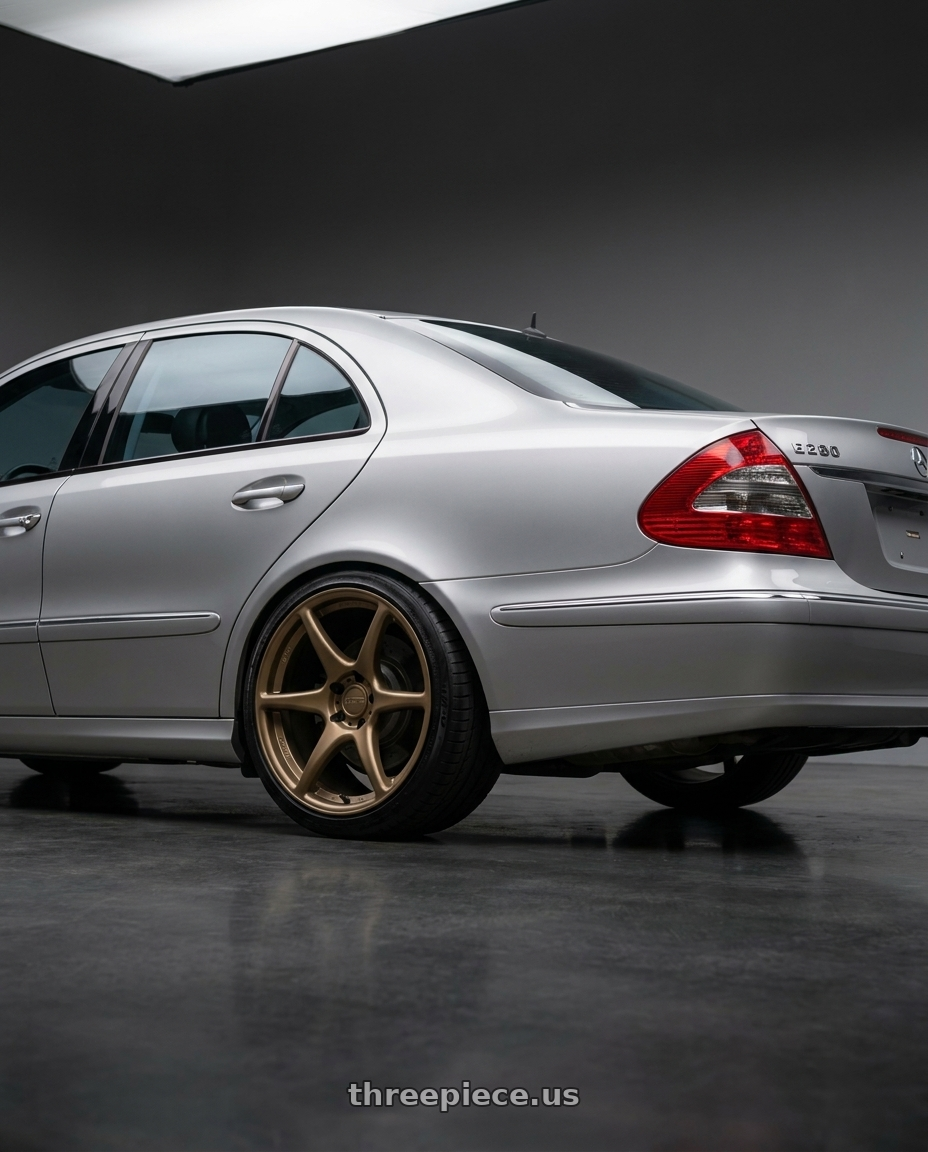 2007 Mercedes E280 W211 with Kansei K11B Tandem 5X108 18x8.5 35 Bronze wheels rear three quarter view square tires