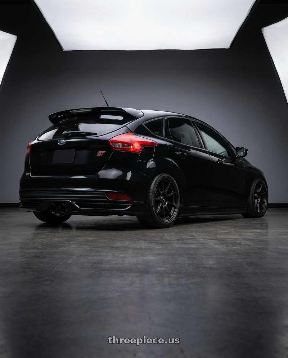2017 Ford Focus St with Konig Dekagram 5x114.3 19x8.5+43 Semi-Matte Black wheels rear three quarter view slight stretch tires