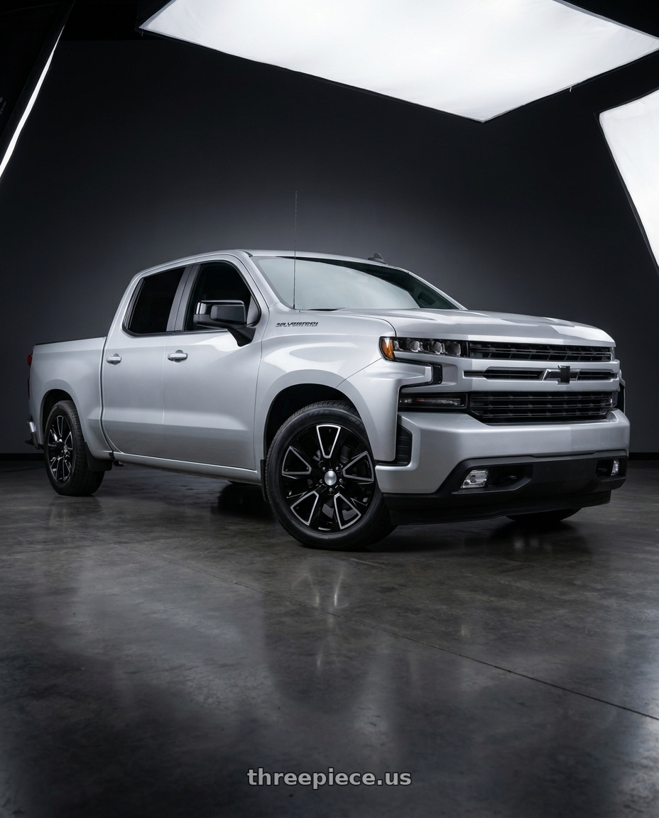 2020 Chevrolet Silverado 1500 with O.E. Revolution C-14 6x139.7 22x9 +28 Gloss Black & Machined wheels