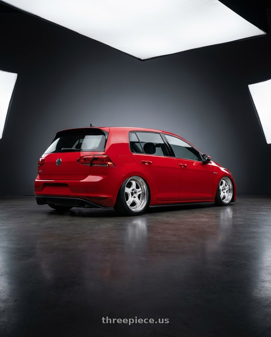 2017 Volkswagen GTI with Work Meister S1 3P 5x112 18x8.5+35 L Disk White wheels rear three quarter view slight stretch tires