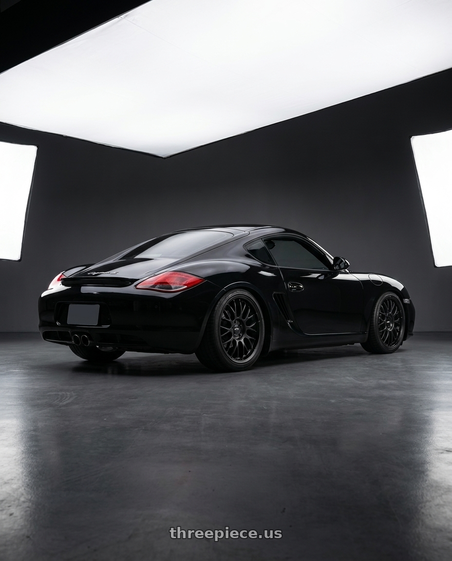 2011 cayman s with Rotiform RC204 PHX 5X120 19x10 +40 MATTE BLACK wheels rear three quarter view square tires