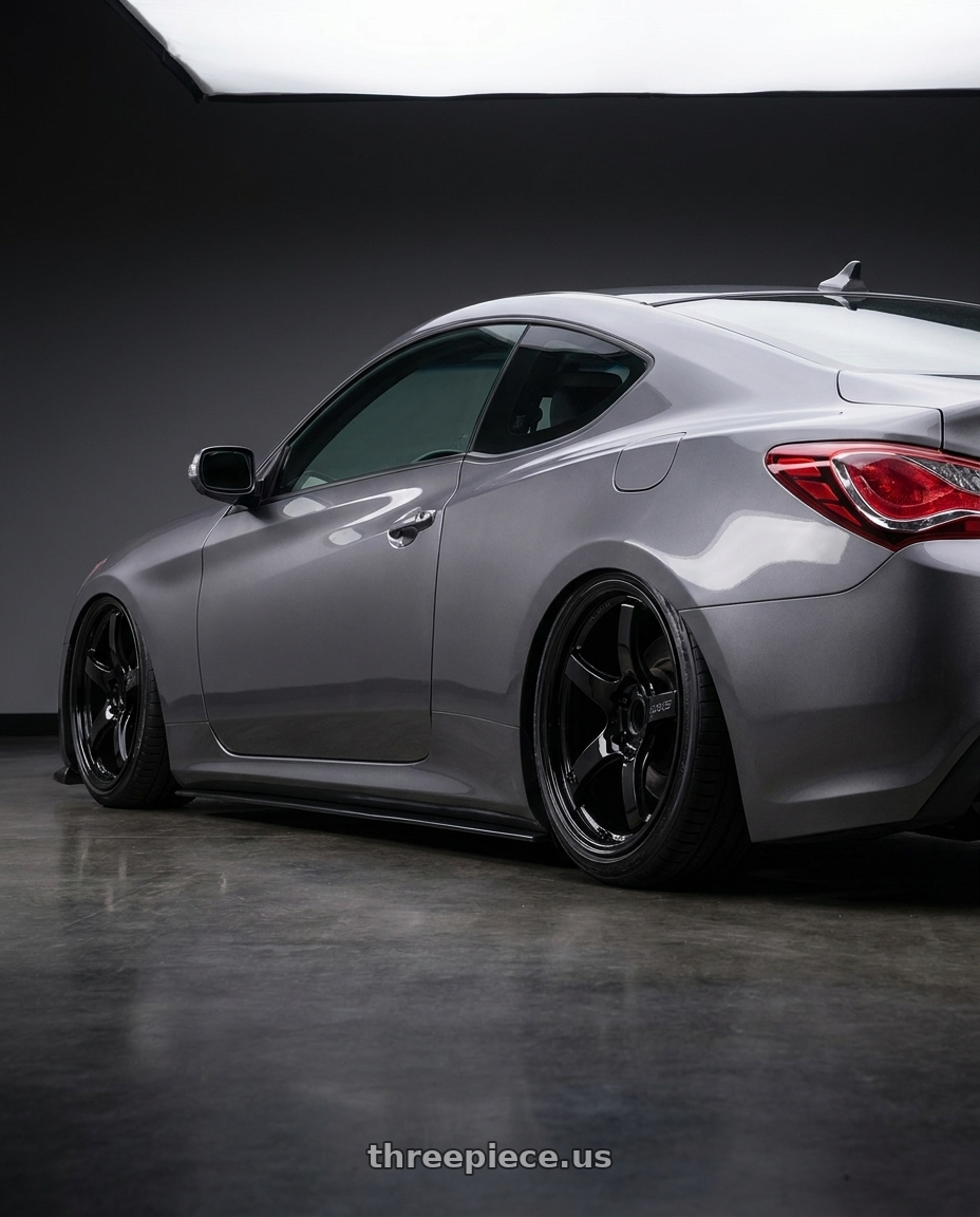 2014 Hyundai Genesis Coupe with Gram Lights 57CR 5x114.3 19x9.5+45 Glossy Black wheels rear three quarter view slight stretch tires