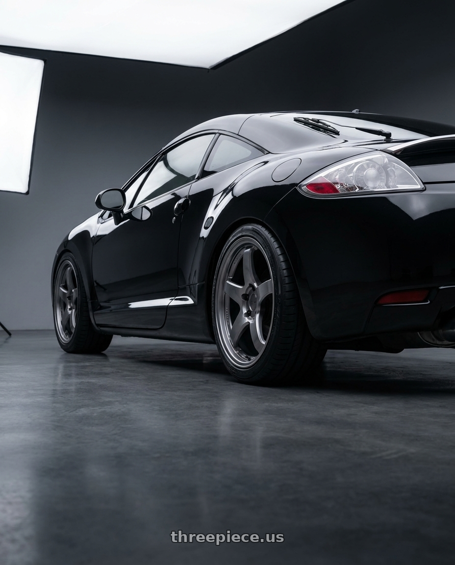2008 Mitsubishi Eclipse 4G Black with Enkei PF05 5x114.3 19x8.5+38 Dark Silver wheels rear three quarter view square tires