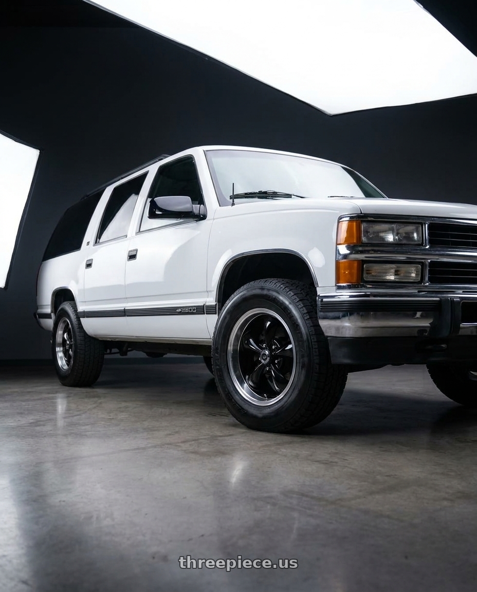 1997 Chevy Suburban C1500 with American Racing AR105 TORQ THRUST M 5X100 16X7 +35 GLOSS BLACK W/ MACHINED LIP wheels