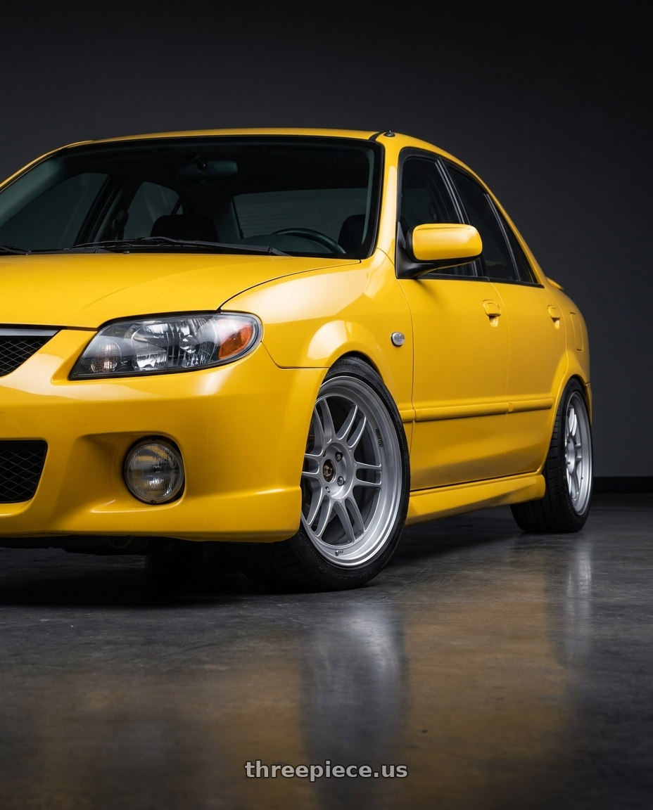 2003 Mazda Protege Mazdaspeed yellow with Enkei RPF1 5x114.3 17x7.5+48 Silver wheels