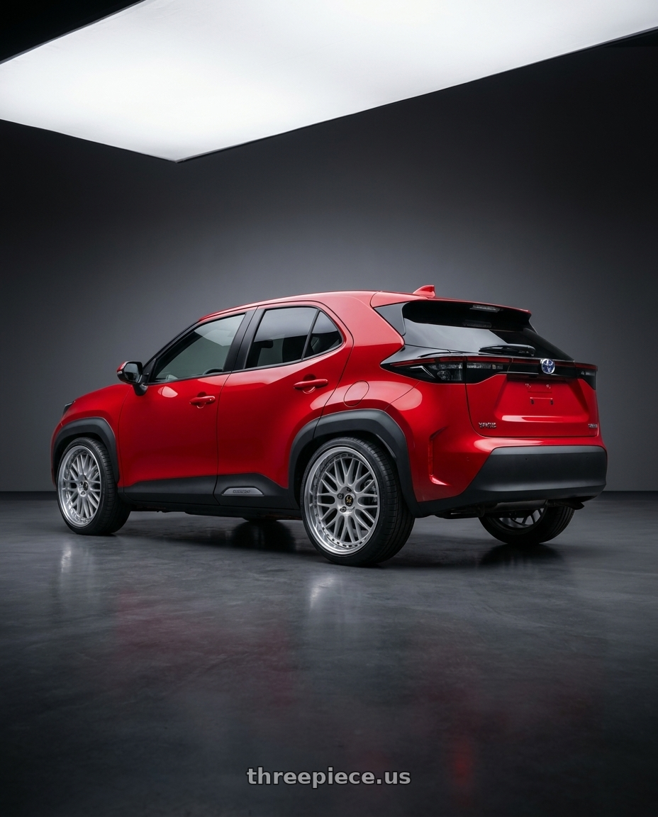 2022 Toyota Yaris Cross with Work Vs-Xx 5x100 18x8.5+7 A Disk Light Grey Silver wheels rear three quarter view square tires