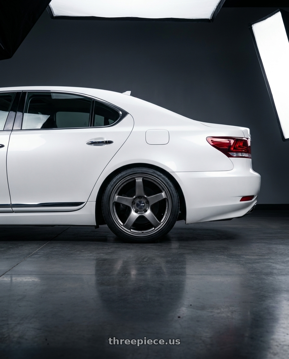 2011 Lexus LS460 with Enkei PF05 5x114.3 19x9+25 Dark Silver wheels rear three quarter view square tires